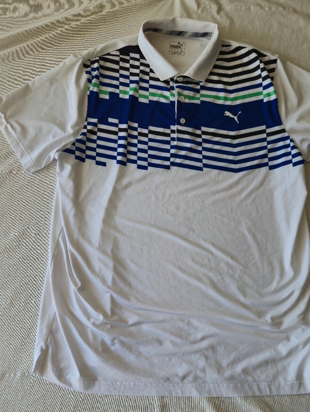 Puma Men's XL White Polo Shirt with Blue, Black, and Green Geometric Pattern